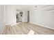 Open living area with light wood floors, recessed lighting, and modern wall shelves, providing an airy feel at 11280 Granite Ridge Dr # 1101, Las Vegas, NV 89135