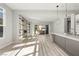 Contemporary living area featuring a fireplace, floating shelves, and a sliding door to a balcony or patio space at 11280 Granite Ridge Dr # 1101, Las Vegas, NV 89135