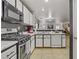 Well-appointed kitchen with stainless steel appliances, ample counter space, and functional design at 1131 Orange Meadow St, Las Vegas, NV 89142