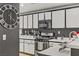 Kitchen with granite countertops, stainless steel appliances, and decorative backsplash at 1131 Orange Meadow St, Las Vegas, NV 89142