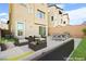 Staged backyard features comfortable seating and dining areas, complemented by lush artificial grass, and mountain views at 11676 Midnight Melody Ave, Las Vegas, NV 89138