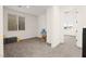 Bright bedroom with carpet floors, a large window, and neutral color scheme, perfect for relaxation at 11676 Midnight Melody Ave, Las Vegas, NV 89138