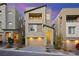 Contemporary two-story home featuring neutral stucco, a two-car garage, and a welcoming entrance with stylish landscaping at 11676 Midnight Melody Ave, Las Vegas, NV 89138