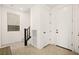 Bright hallway with modern tile flooring, featuring convenient access to multiple rooms at 11676 Midnight Melody Ave, Las Vegas, NV 89138