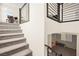 Staircase showcasing access to the upstairs and basement at 11676 Midnight Melody Ave, Las Vegas, NV 89138