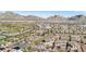 Beautiful aerial view of a gated community nestled in the mountains, offering picturesque and peaceful living at 11878 Albissola Ave, Las Vegas, NV 89138