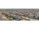 Expansive aerial view showing a neighborhood of homes with neat landscaping that is close to everything at 11878 Albissola Ave, Las Vegas, NV 89138