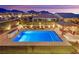Elevated view showcases the sparkling pool, gazebo, backyard oasis, and surrounding neighborhood at 11878 Albissola Ave, Las Vegas, NV 89138