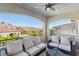 Spacious balcony area with comfortable outdoor furniture and neighborhood views at 11878 Albissola Ave, Las Vegas, NV 89138