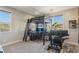 A modern bedroom featuring a loft bed with a study area, offering a stylish and functional space at 11878 Albissola Ave, Las Vegas, NV 89138