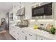 Well-lit kitchen features stainless steel appliances, white cabinetry, and a gas cooktop at 11878 Albissola Ave, Las Vegas, NV 89138