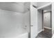 Bright bathroom showcasing a clean, white tub with a shower at 11890 Tevare Ln # 1098, Las Vegas, NV 89138