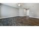 Bedroom featuring dark-toned hardwood floors, neutral wall color, and white trim at 11890 Tevare Ln # 1098, Las Vegas, NV 89138