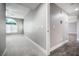 Comfortable bedroom featuring soft carpet flooring, natural light, and neutral decor at 11890 Tevare Ln # 1098, Las Vegas, NV 89138