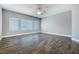 Bedroom with hardwood flooring, recessed lighting, and large windows at 11890 Tevare Ln # 1098, Las Vegas, NV 89138