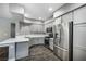 New kitchen features modern appliances, a breakfast bar and lots of counter space at 11890 Tevare Ln # 1098, Las Vegas, NV 89138