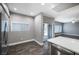 Bright, open kitchen area with stainless steel appliances and sliding glass door access to backyard at 11890 Tevare Ln # 1098, Las Vegas, NV 89138