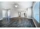 Open-concept living area with lots of natural light, modern flooring and neutral gray color scheme at 11890 Tevare Ln # 1098, Las Vegas, NV 89138