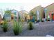 A common area with a bench and plants provides a relaxing outdoor space at 12800 Oceano Dunes Ct, Henderson, NV 89044