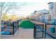 Fenced dog park with artificial turf offers a safe and clean play area for pets at 12800 Oceano Dunes Ct, Henderson, NV 89044