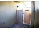 Private patio with secure fence and camera enhances the outdoor space at 12800 Oceano Dunes Ct, Henderson, NV 89044