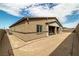 This yard features desert landscaping, perfectly framing the modern home, and requires minimal maintenance at 135 Barnett Crest Ct, Henderson, NV 89015