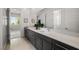 Double vanity bathroom featuring dark wood cabinetry and lots of space at 135 Barnett Crest Ct, Henderson, NV 89015