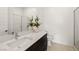Modern bathroom with sleek vanity, a spacious countertop, and a glass-enclosed shower at 135 Barnett Crest Ct, Henderson, NV 89015