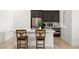 Modern kitchen featuring an island with seating and stainless steel appliances at 135 Barnett Crest Ct, Henderson, NV 89015