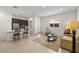 Spacious open-concept living area connecting the kitchen, dining, and living spaces at 135 Barnett Crest Ct, Henderson, NV 89015