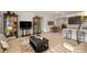 Open-concept living space with seating, dining, and kitchen areas at 135 Barnett Crest Ct, Henderson, NV 89015
