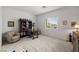 Bright office space with built-in shelving and a comfortable sitting area, perfect for working from home at 135 Barnett Crest Ct, Henderson, NV 89015