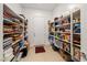 Walk-in pantry with organized shelving, providing ample storage space for food and household items at 135 Barnett Crest Ct, Henderson, NV 89015