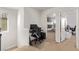 Upstairs hallway with work area and view into a bedroom with bunkbeds at 173 Volti Subito Way, Henderson, NV 89011