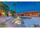 Backyard boasts a custom pool, spa, and built-in bar area, perfect for outdoor entertaining at 1983 Songbird Ct, Henderson, NV 89012
