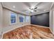 Bright, airy bedroom featuring wood floors, recessed lights, and bright windows at 1983 Songbird Ct, Henderson, NV 89012