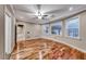 Bright, airy bedroom featuring wood floors, recessed lights, ceiling fan and bright windows at 1983 Songbird Ct, Henderson, NV 89012