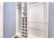 Well-organized closet with built-in shelving and hanging rods for optimal storage at 1983 Songbird Ct, Henderson, NV 89012