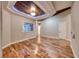 The living room has hardwood floors, tray ceiling, and natural light, creating an inviting atmosphere at 1983 Songbird Ct, Henderson, NV 89012