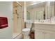 Bathroom featuring a glass door shower and large mirror at 2007 High Mesa Dr, Henderson, NV 89012