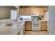 Well-lit kitchen with ample countertop space and white appliances at 2007 High Mesa Dr, Henderson, NV 89012