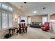 Comfortable living room with neutral paint and open layout to other rooms at 2007 High Mesa Dr, Henderson, NV 89012