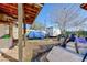Spacious backyard with laundry hookups, covered area, and plenty of storage space at 2054 Harvard St, North Las Vegas, NV 89030