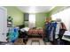 Cozy bedroom with natural light from the window and tile flooring at 2054 Harvard St, North Las Vegas, NV 89030