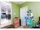View of the hallway with tile floor leading to the kitchen and a front door at 2054 Harvard St, North Las Vegas, NV 89030