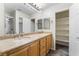 Bathroom boasts a double sink vanity and a new walk-in shower at 206 Lynbrook St, Henderson, NV 89012