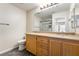 Bathroom features a double vanity with granite countertops at 206 Lynbrook St, Henderson, NV 89012