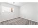 Bedroom with neutral carpet, fresh paint, a window, and natural light at 206 Lynbrook St, Henderson, NV 89012