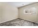 Bedroom with wood look floors and natural light at 206 Lynbrook St, Henderson, NV 89012