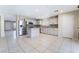 Bright, open kitchen with stainless steel appliances, a center island, and modern cabinetry for ample storage at 206 Lynbrook St, Henderson, NV 89012